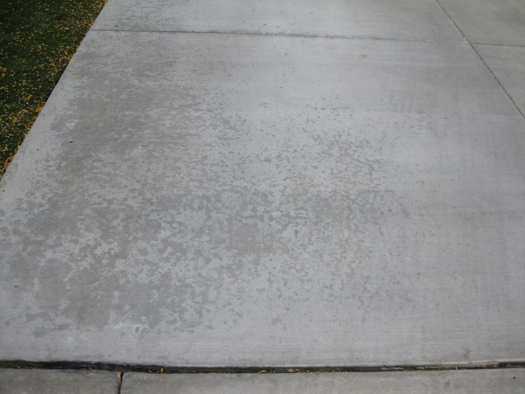 After fertilizer stain removal on concrete